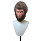 Monkey mask on a mannequin head against a white background