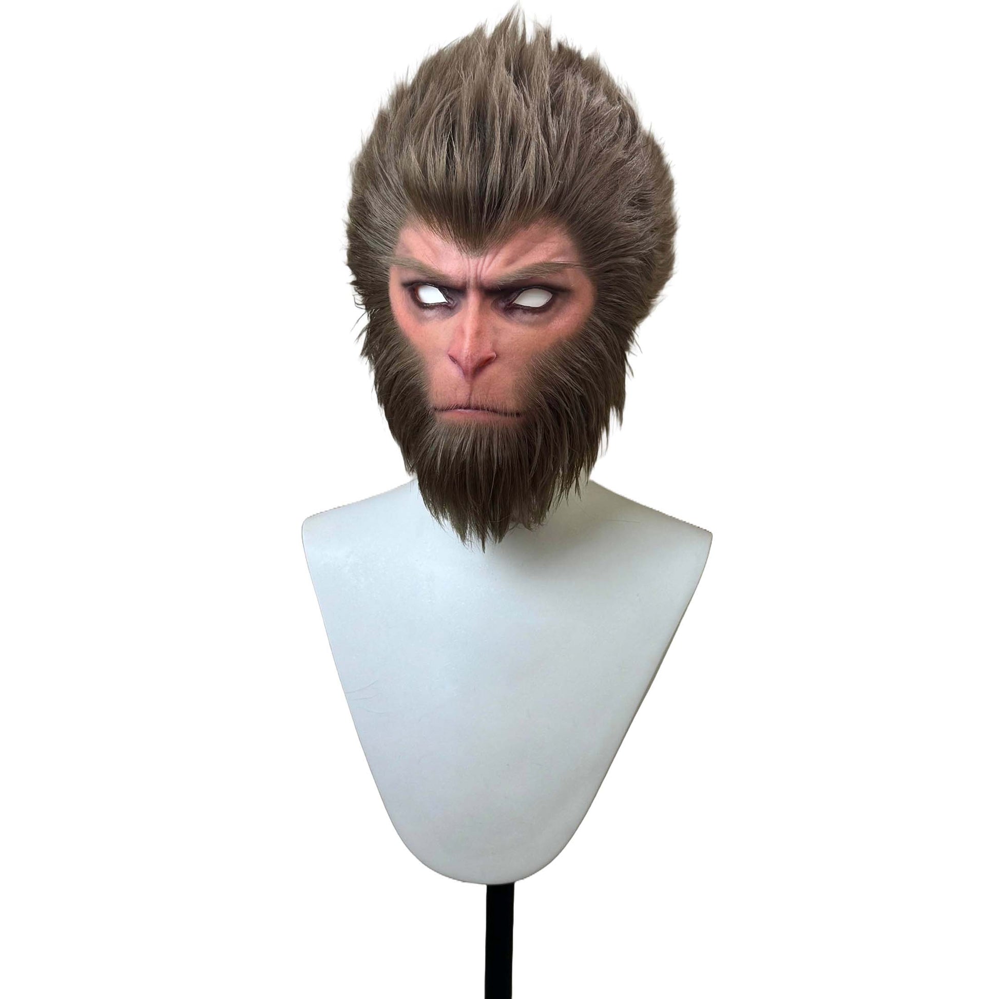 Monkey mask on a mannequin head against a white background