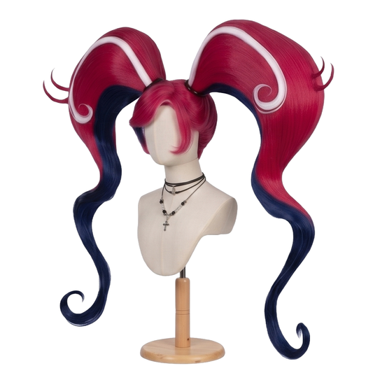 Left side view of Velvette Hazbin Hotel wig showing desire-red pigtail hair, dark navy-blue inner layers, white swirl streak, and professionally styled cosplay details