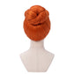 Back view of The Flintstones Wilma wig with smooth red-orange texture